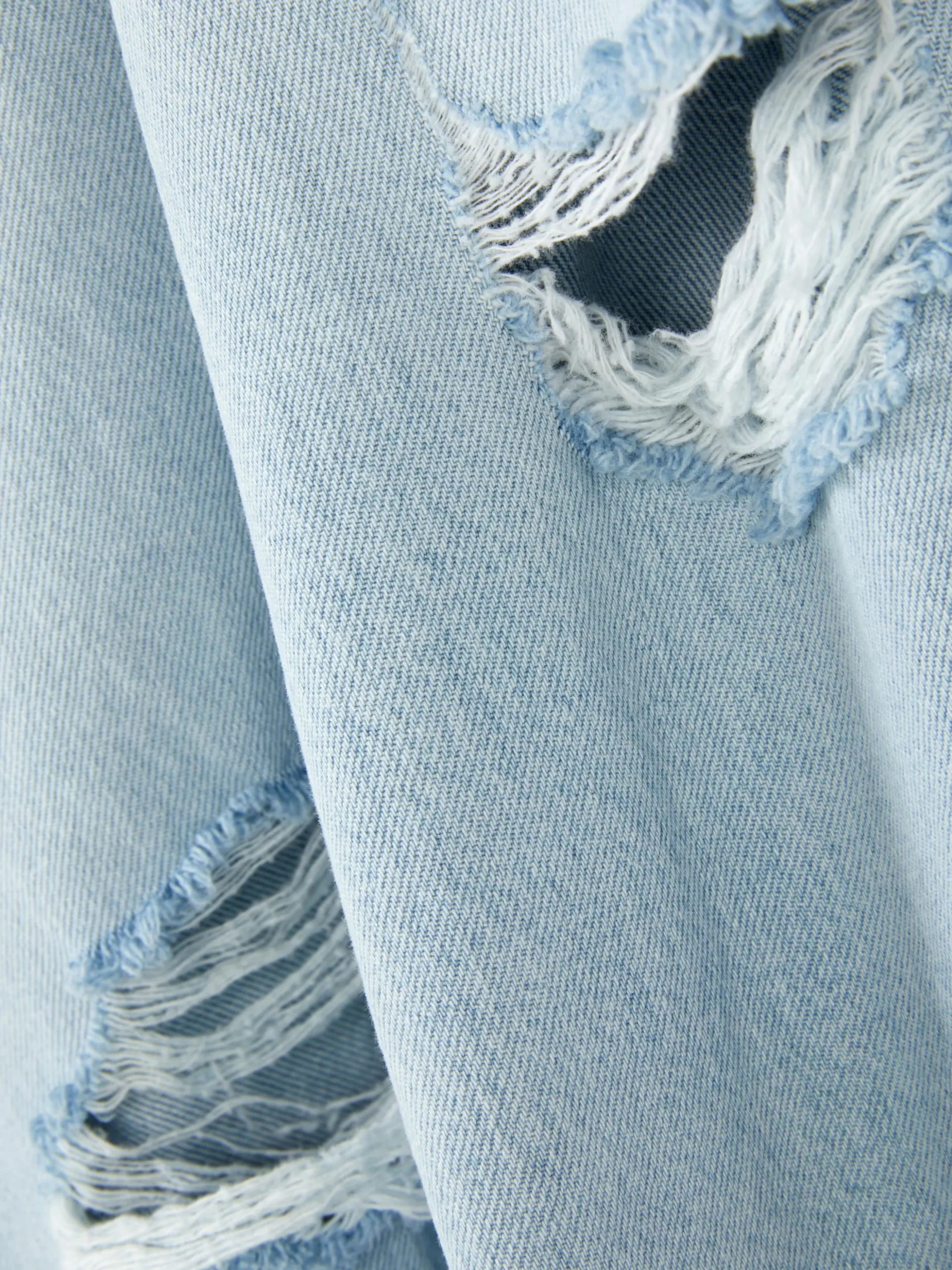 Calças Ganga Corte Perna Larga Desgastadas