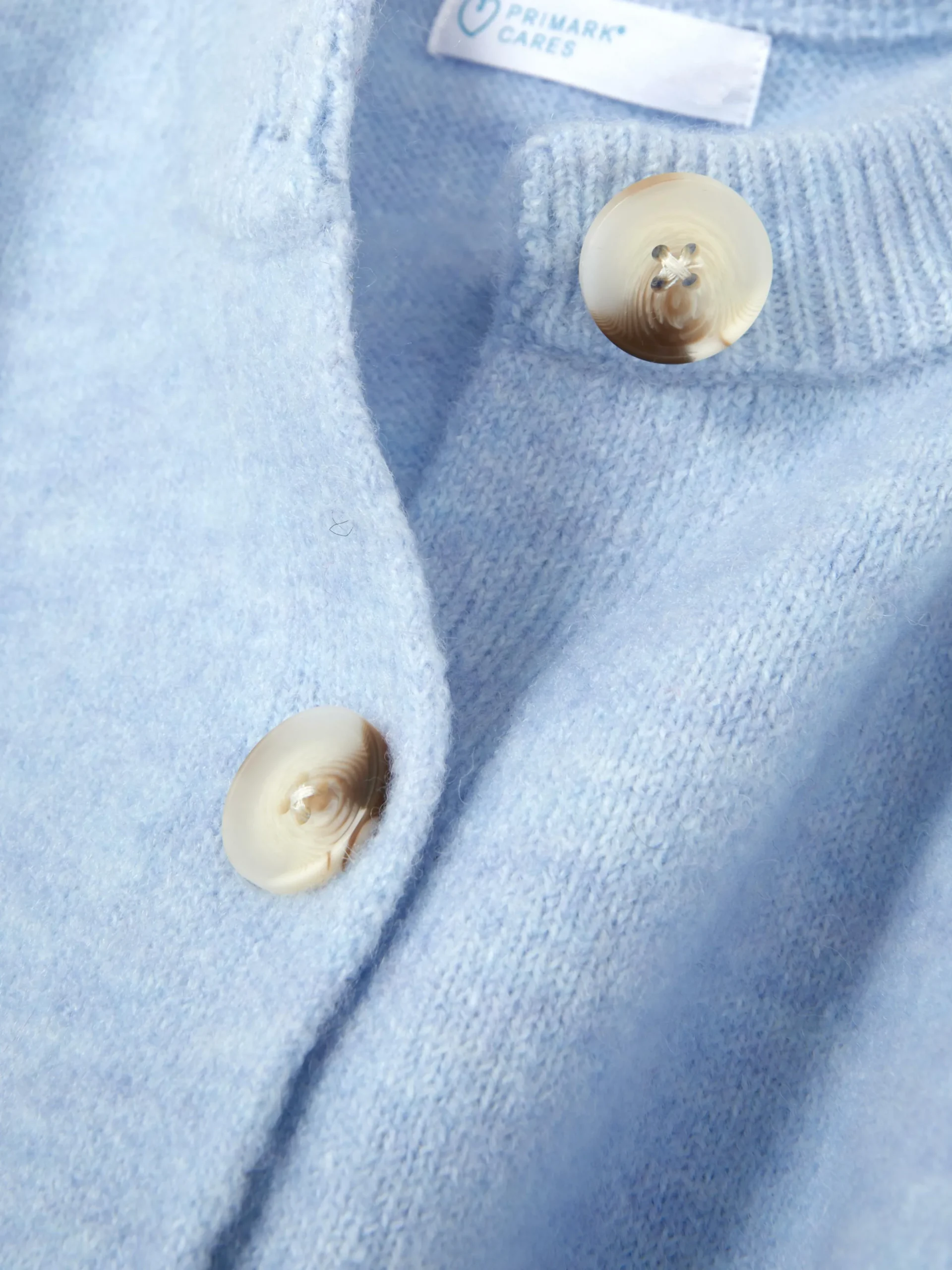 Casaco Malha Gola Redonda Botões