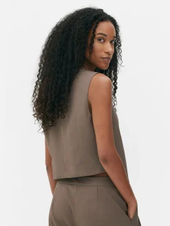 Colete Corte Assimétrico Botão Frente