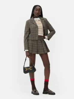 Saia-calção Mini Xadrez Detalhe Fivela Rita Ora