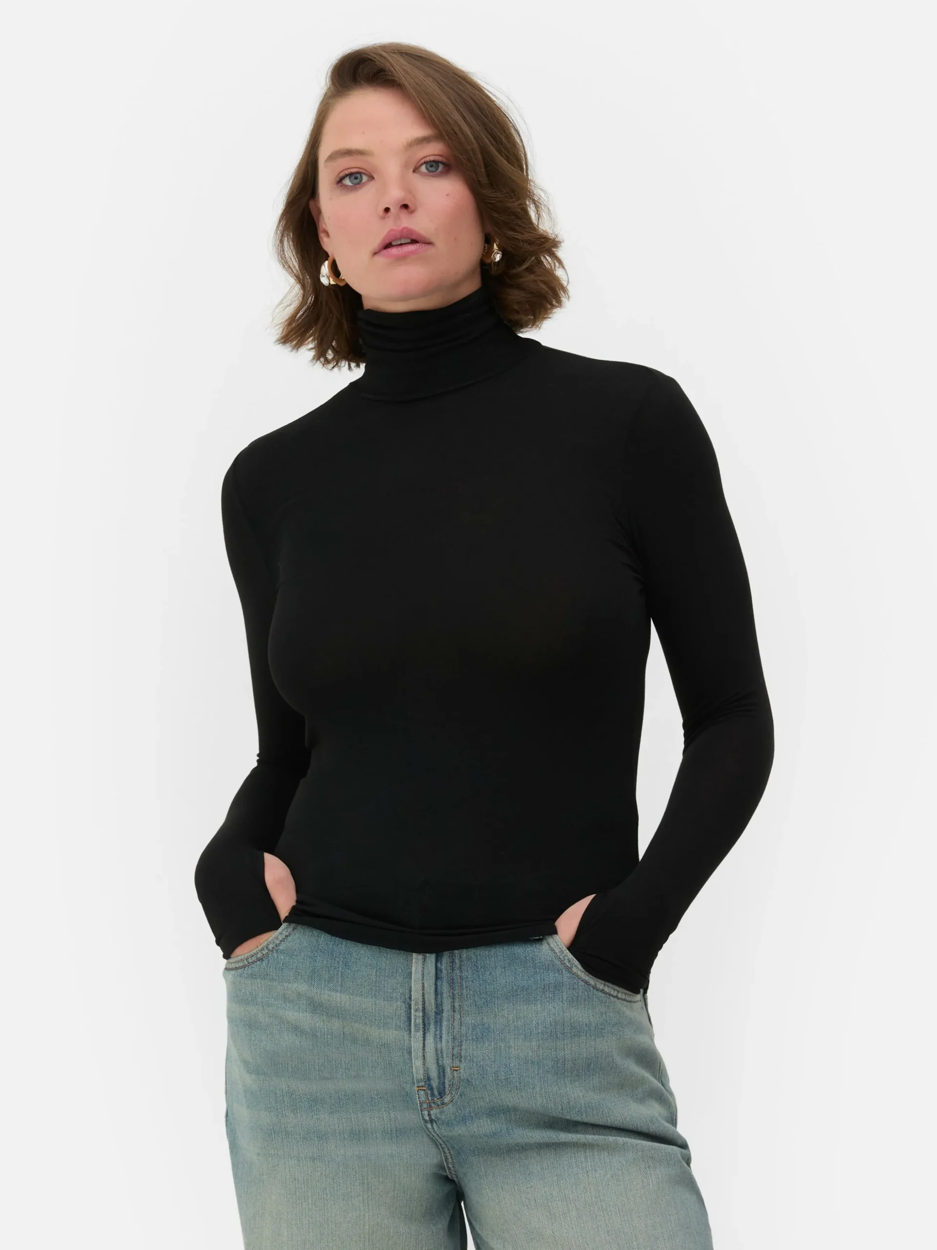 Top Manga Comprida Gola Alta Rita Ora